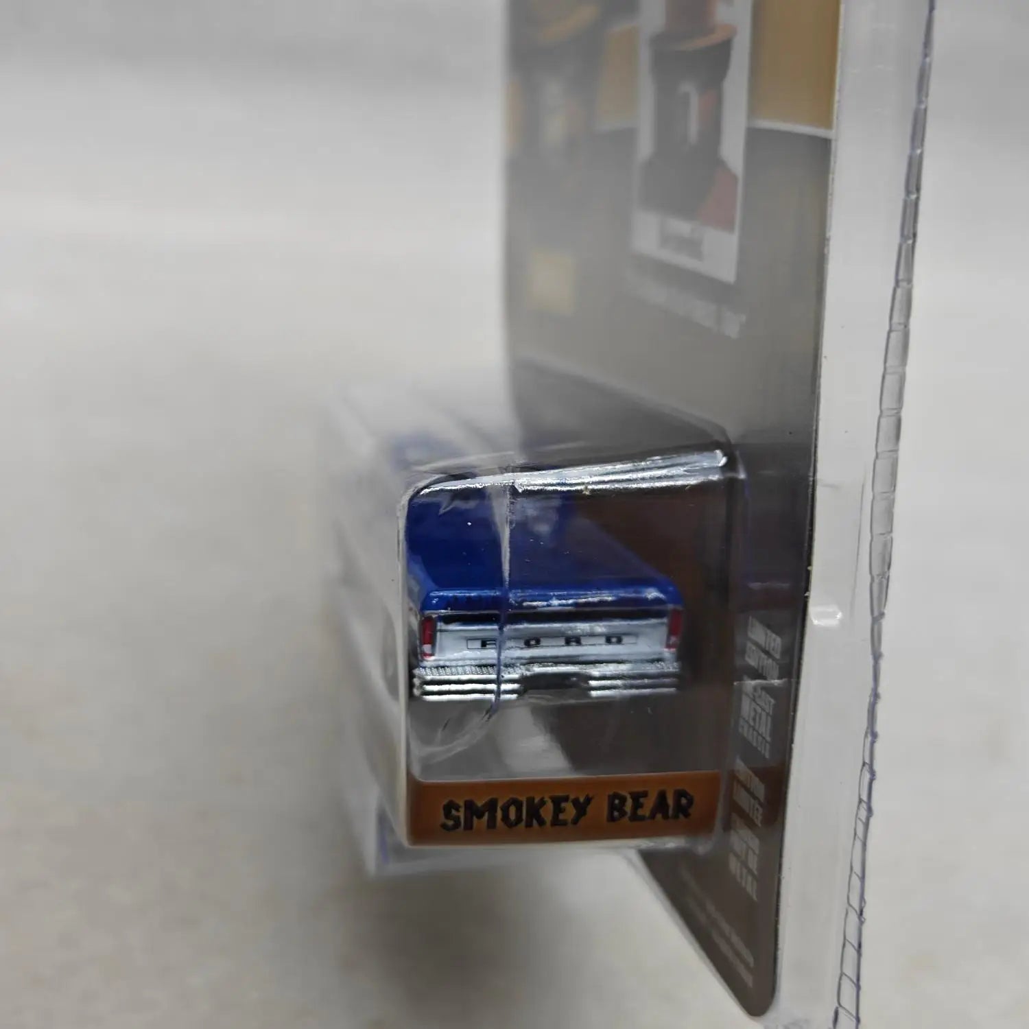 GreenLight Ford Smoked Bear Series 4-1976 F 1:64 Diecast